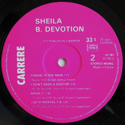 Sheila B. Devotion* : Love Me Baby (Including Singin' In The Rain) (LP, Album)